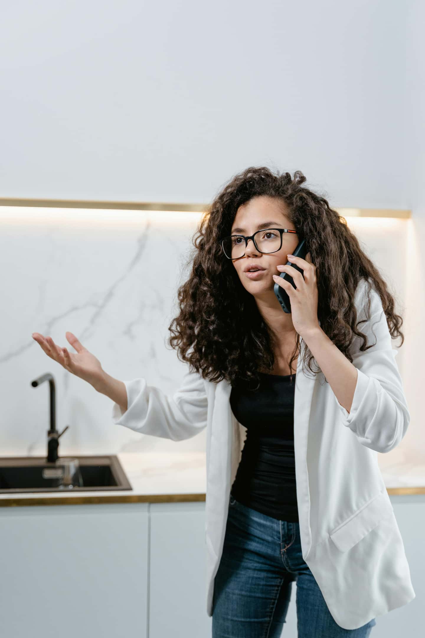 Frustrated manager on the phone while trying to resolve a coverage issue