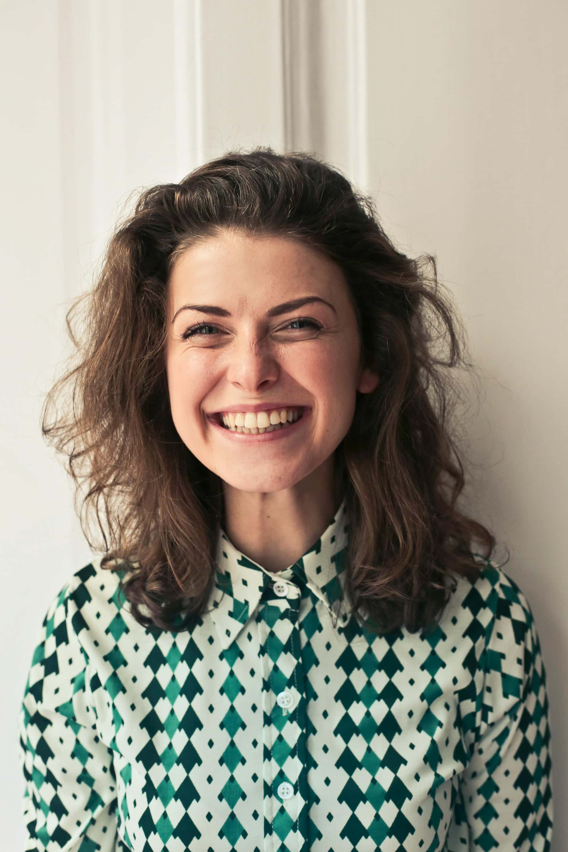 Support team member smiling in an office